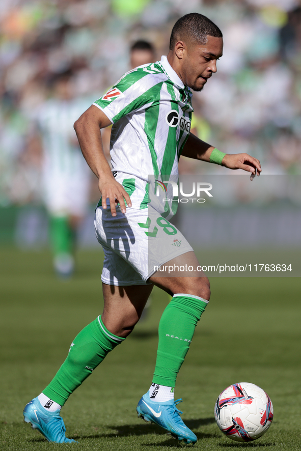 Vitor Roque of Real Betis runs with the ball during the La Liga EA Sport match between Real Betis and RC Celta de Vigo at Benito Villamarin...