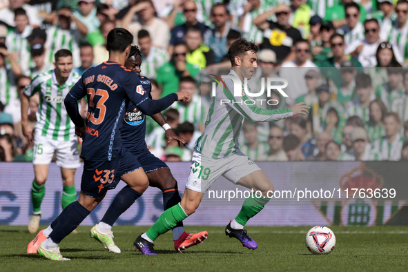 Iker Losada of Real Betis runs with the ball during the La Liga EA Sport match between Real Betis and RC Celta de Vigo at Benito Villamarin...