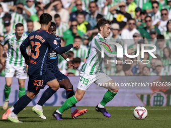 Iker Losada of Real Betis runs with the ball during the La Liga EA Sport match between Real Betis and RC Celta de Vigo at Benito Villamarin...