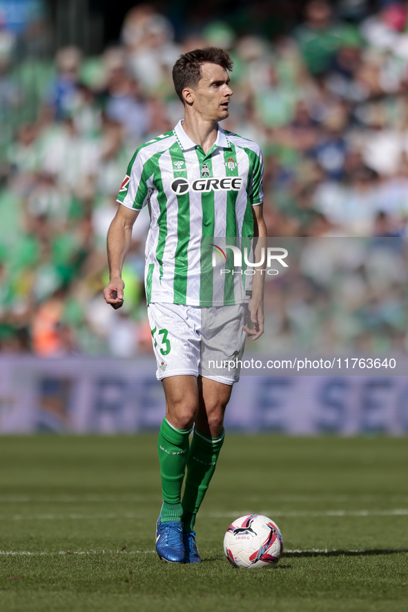 Diego Llorente of Real Betis runs with the ball during the La Liga EA Sport match between Real Betis and RC Celta de Vigo at Benito Villamar...