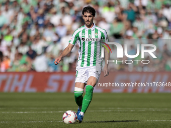 Johnny Cardoso of Real Betis runs with the ball during the La Liga EA Sport match between Real Betis and RC Celta de Vigo at Benito Villamar...