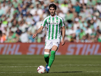 Johnny Cardoso of Real Betis runs with the ball during the La Liga EA Sport match between Real Betis and RC Celta de Vigo at Benito Villamar...