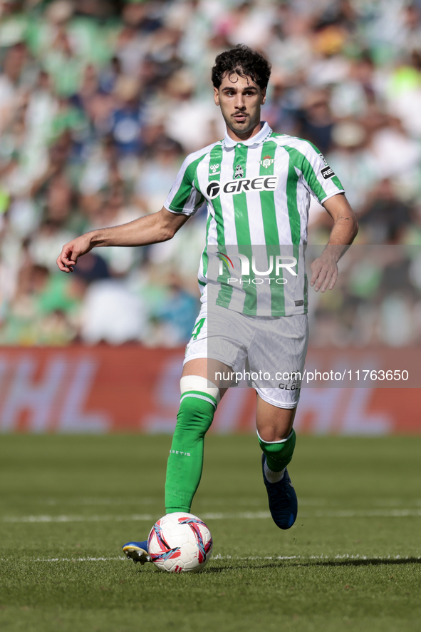 Johnny Cardoso of Real Betis runs with the ball during the La Liga EA Sport match between Real Betis and RC Celta de Vigo at Benito Villamar...