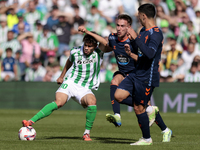 Ez Abde of Real Betis battles for the ball during the La Liga EA Sport match between Real Betis and RC Celta de Vigo at Benito Villamarin in...