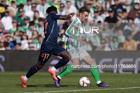 Iker Losada of Real Betis runs with the ball during the La Liga EA Sport match between Real Betis and RC Celta de Vigo at Benito Villamarin...