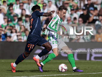 Iker Losada of Real Betis runs with the ball during the La Liga EA Sport match between Real Betis and RC Celta de Vigo at Benito Villamarin...