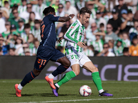 Iker Losada of Real Betis runs with the ball during the La Liga EA Sport match between Real Betis and RC Celta de Vigo at Benito Villamarin...