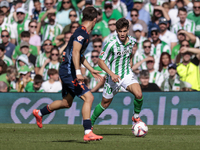 Ez Abde of Real Betis runs with the ball during the La Liga EA Sport match between Real Betis and RC Celta de Vigo at Benito Villamarin in S...