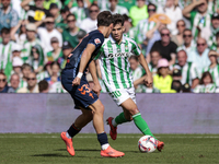 Ez Abde of Real Betis runs with the ball during the La Liga EA Sport match between Real Betis and RC Celta de Vigo at Benito Villamarin in S...