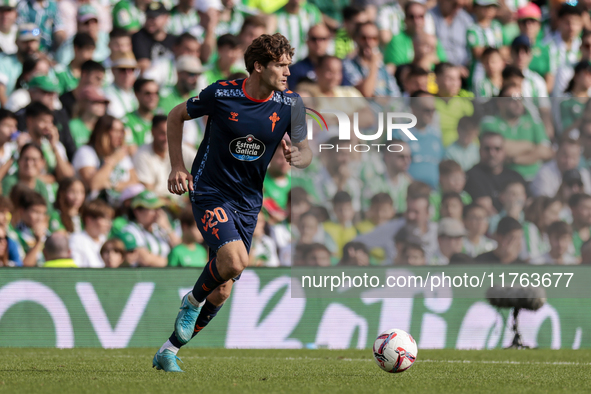 Marcos Alonso of RC Celta de Vigo runs with the ball during the La Liga EA Sport match between Real Betis and RC Celta de Vigo at Benito Vil...