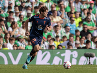 Marcos Alonso of RC Celta de Vigo runs with the ball during the La Liga EA Sport match between Real Betis and RC Celta de Vigo at Benito Vil...