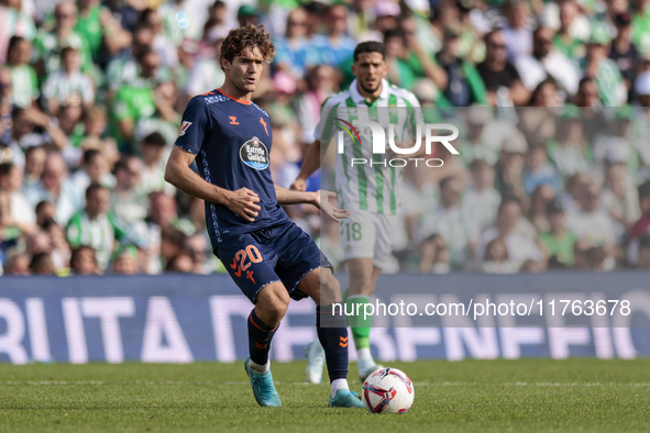 Marcos Alonso of RC Celta de Vigo passes the ball during the La Liga EA Sport match between Real Betis and RC Celta de Vigo at Benito Villam...