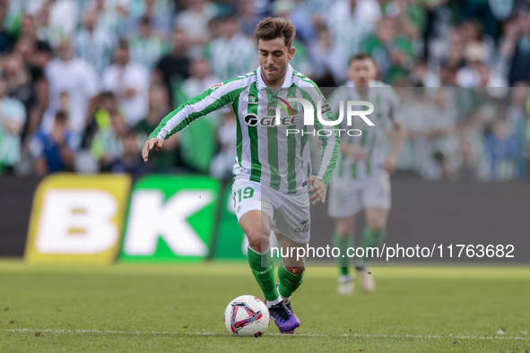 Iker Losada of Real Betis runs with the ball during the La Liga EA Sport match between Real Betis and RC Celta de Vigo at Benito Villamarin...