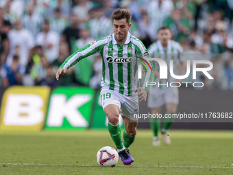 Iker Losada of Real Betis runs with the ball during the La Liga EA Sport match between Real Betis and RC Celta de Vigo at Benito Villamarin...