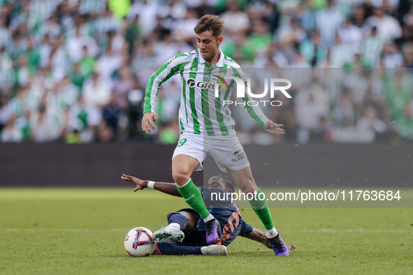 Iker Losada of Real Betis battles for the ball during the La Liga EA Sport match between Real Betis and RC Celta de Vigo at Benito Villamari...