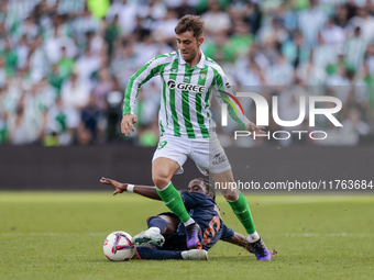 Iker Losada of Real Betis battles for the ball during the La Liga EA Sport match between Real Betis and RC Celta de Vigo at Benito Villamari...