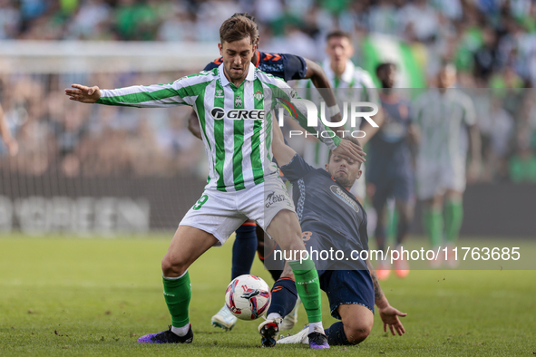 Iker Losada of Real Betis battles for the ball during the La Liga EA Sport match between Real Betis and RC Celta de Vigo at Benito Villamari...