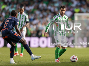 Giovani Lo Celso of Real Betis runs with the ball during the La Liga EA Sport match between Real Betis and RC Celta de Vigo at Benito Villam...