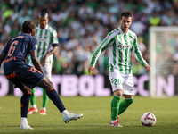 Giovani Lo Celso of Real Betis runs with the ball during the La Liga EA Sport match between Real Betis and RC Celta de Vigo at Benito Villam...