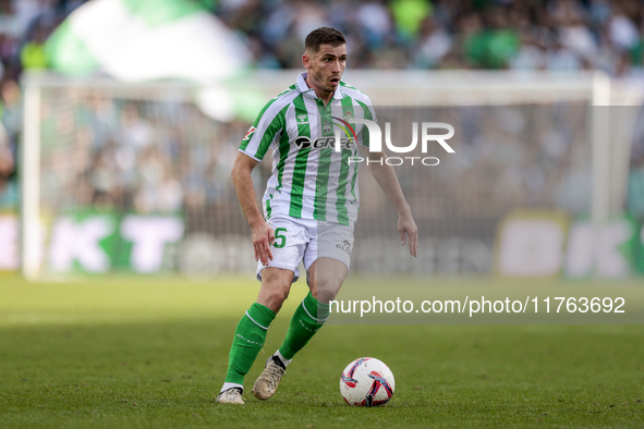 Romain Perraud of Real Betis runs with the ball during the La Liga EA Sport match between Real Betis and RC Celta de Vigo at Benito Villamar...