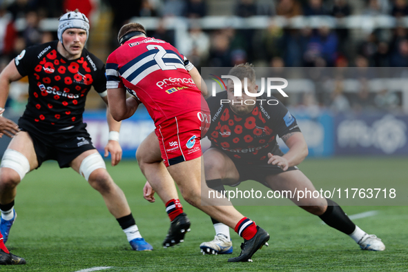 Murray McCallum of Newcastle Falcons lines up Fred Davies of Doncaster Knights for a tackle during the Premiership Cup Pool A match between...