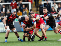 Kiran McDonald of Newcastle Falcons tries to break a tackle during the Premiership Cup Pool A match between Newcastle Falcons and Doncaster...