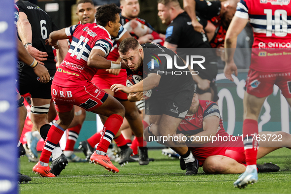 Ollie Fletcher of Newcastle Falcons charges through during the Premiership Cup Pool A match between Newcastle Falcons and Doncaster Knights...