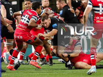 Ollie Fletcher of Newcastle Falcons charges through during the Premiership Cup Pool A match between Newcastle Falcons and Doncaster Knights...