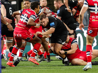 Ollie Fletcher of Newcastle Falcons charges through during the Premiership Cup Pool A match between Newcastle Falcons and Doncaster Knights...