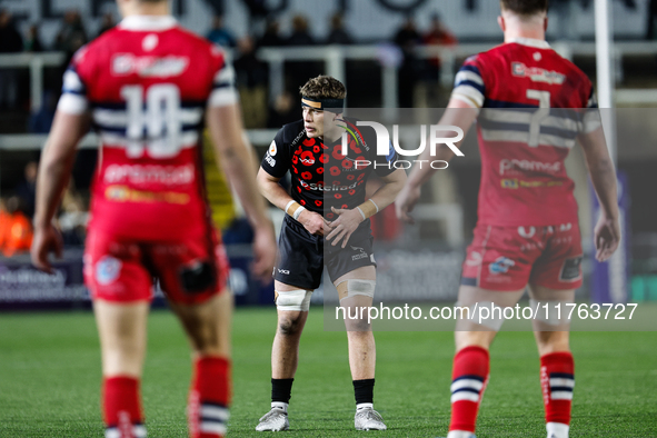 Reuben Parsons (center) of Newcastle Falcons prepares to take a pass during the Premiership Cup Pool A match between Newcastle Falcons and D...