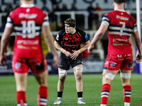 Reuben Parsons (center) of Newcastle Falcons prepares to take a pass during the Premiership Cup Pool A match between Newcastle Falcons and D...