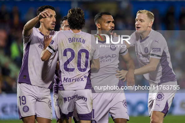 Yangel Herrera of Girona FC (C) celebrates his goal with his teammates (from L to R) Bojan Miovski, Bryan Gil, and Donny van de Beek during...