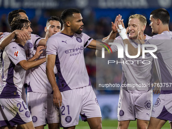 Yangel Herrera of Girona FC (center) celebrates his goal with his teammates (from left to right) Bojan Miovski, Bryan Gil, Donny van de Beek...