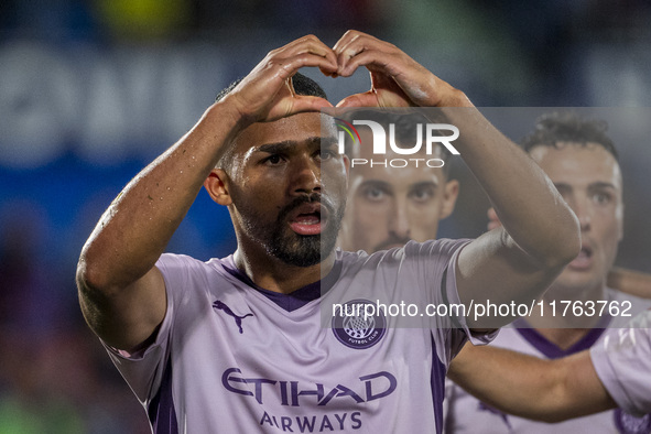 Yangel Herrera of Girona FC (C) celebrates his goal during the La Liga EA Sports 2024/25 football match between Getafe CF and Girona FC at E...