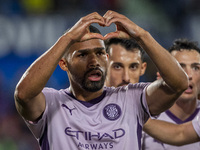 Yangel Herrera of Girona FC (C) celebrates his goal during the La Liga EA Sports 2024/25 football match between Getafe CF and Girona FC at E...