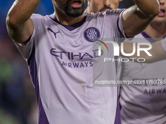 Yangel Herrera of Girona FC (C) celebrates his goal during the La Liga EA Sports 2024/25 football match between Getafe CF and Girona FC at E...