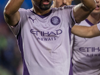 Yangel Herrera of Girona FC (C) celebrates his goal during the La Liga EA Sports 2024/25 football match between Getafe CF and Girona FC at E...