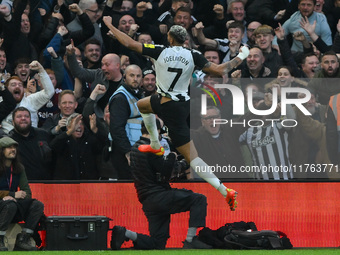 Joelinton of Newcastle United celebrates after scoring a goal to make it 1-2 during the Premier League match between Nottingham Forest and N...