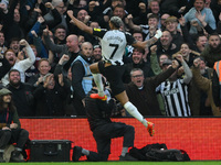 Joelinton of Newcastle United celebrates after scoring a goal to make it 1-2 during the Premier League match between Nottingham Forest and N...