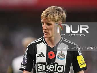 Anthony Gordon of Newcastle United participates in the Premier League match between Nottingham Forest and Newcastle United at the City Groun...