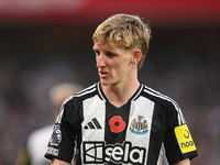 Anthony Gordon of Newcastle United participates in the Premier League match between Nottingham Forest and Newcastle United at the City Groun...