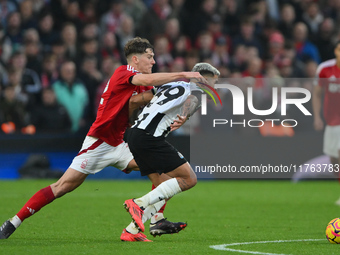 Ryan Yates of Nottingham Forest competes with Bruno Guimaraes of Newcastle United during the Premier League match between Nottingham Forest...