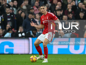 Nikola Milenkovic of Nottingham Forest passes the ball during the Premier League match between Nottingham Forest and Newcastle United at the...