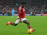 Ola Aina of Nottingham Forest is in action during the Premier League match between Nottingham Forest and Newcastle United at the City Ground...