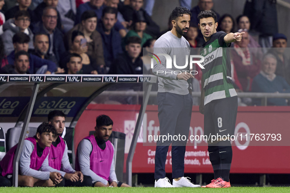 Pedro Goncalves of Sporting CP talks with Ruben Amorim, Head Coach of Sporting CP, during the Liga Portugal Betclic match between SC Braga a...