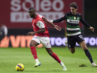 Francisco Trincao of Sporting CP competes for the ball with Sikou Niakate of SC Braga during the Liga Portugal Betclic match between SC Brag...