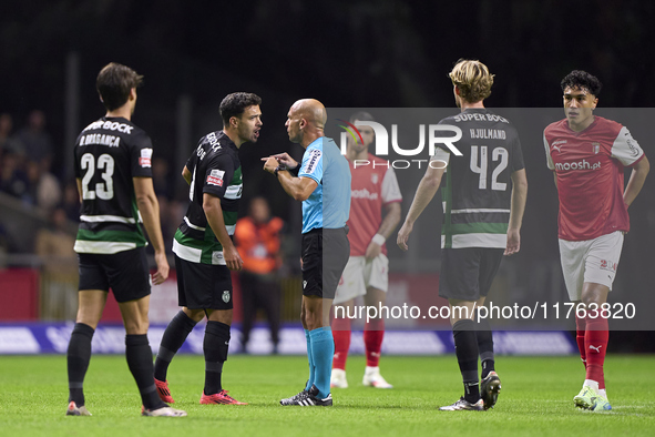 Pedro Goncalves of Sporting CP discusses with referee Luis Godinho during the Liga Portugal Betclic match between SC Braga and Sporting CP a...