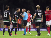 Pedro Goncalves of Sporting CP discusses with referee Luis Godinho during the Liga Portugal Betclic match between SC Braga and Sporting CP a...