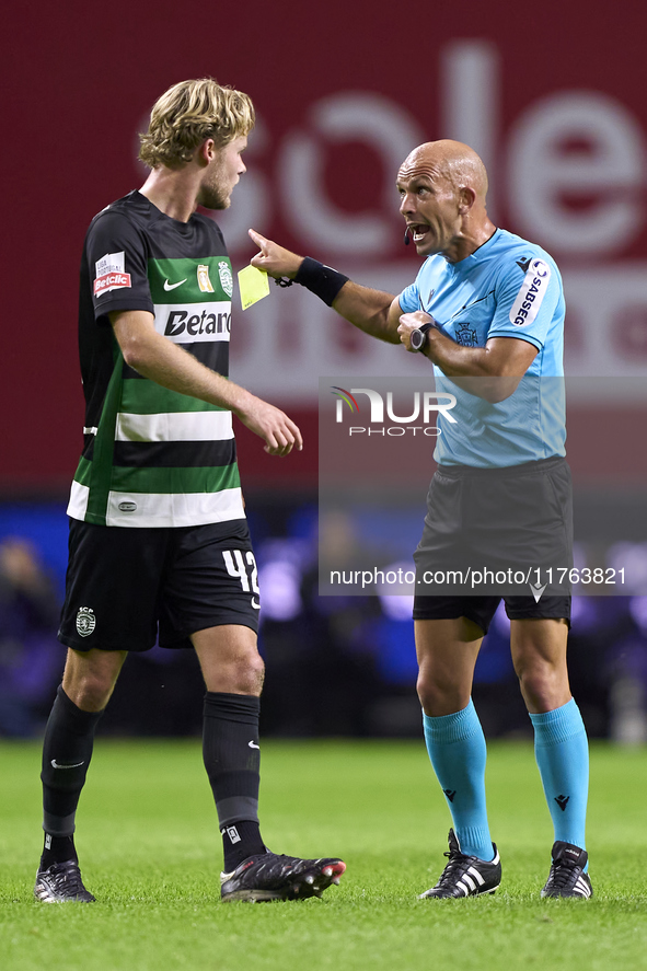 Morten Hjulmand of Sporting CP discusses with referee Luis Godinho during the Liga Portugal Betclic match between SC Braga and Sporting CP a...