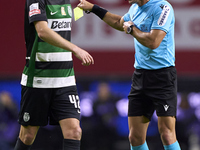 Morten Hjulmand of Sporting CP discusses with referee Luis Godinho during the Liga Portugal Betclic match between SC Braga and Sporting CP a...